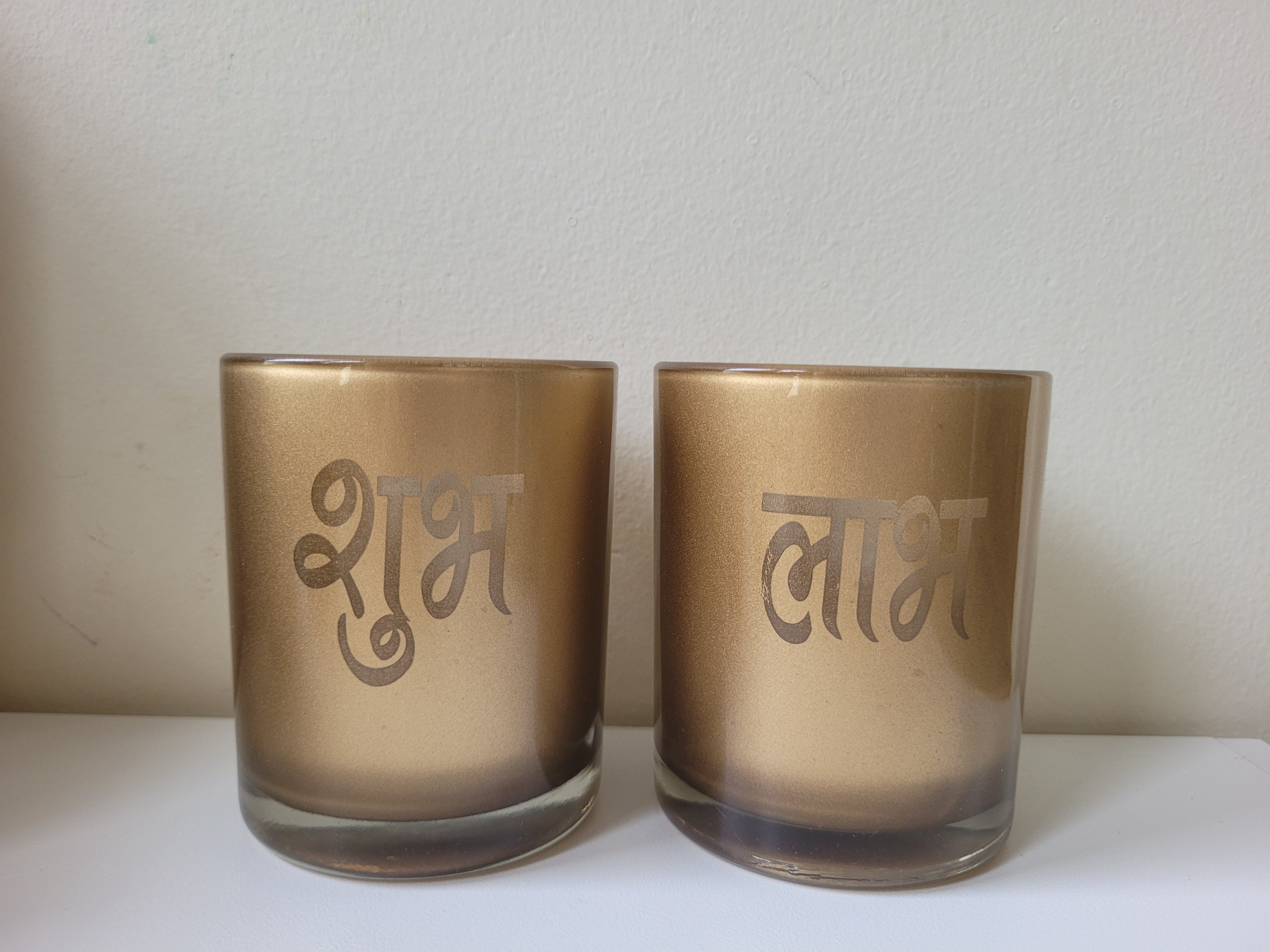 Golden Shubh & Labh Glass Candle Jar Combo Set of 2